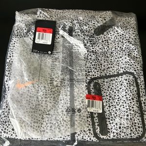 Nike White/Black leopard rain jacket brand new still in wrapper.  Men’s large
